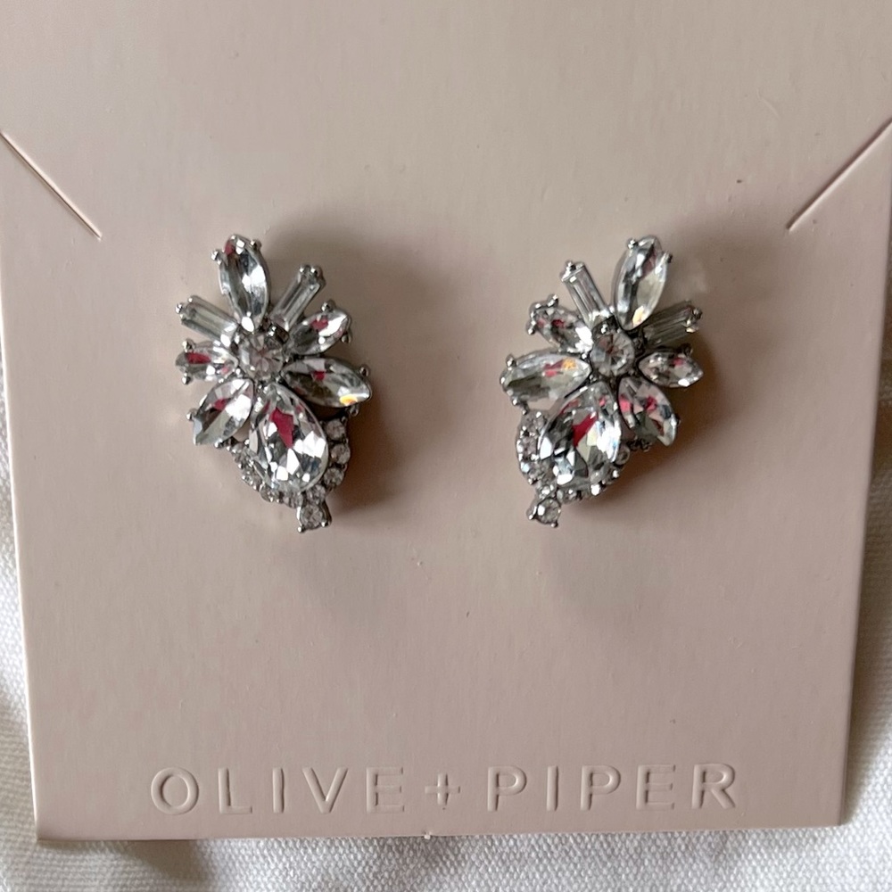 Oliver + Piper statement stud earrings.